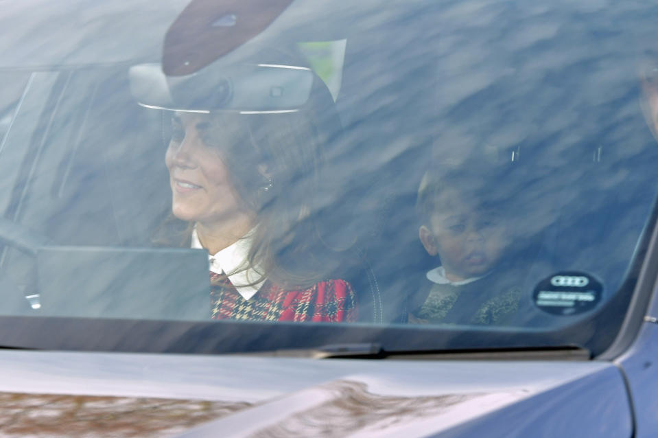 The Duchess of Cambridge arrived in a festive tartan ensemble. [Photo: PA]