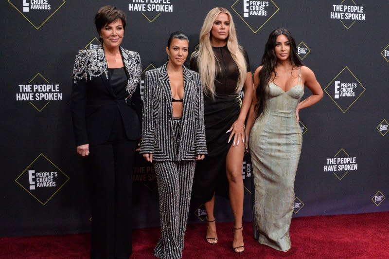 Left to right, Kris Jenner, Kourtney Kardashian, Khloé Kardashian, and Kim Kardashian arrive for the 45th annual E! People's Choice Awards at the Barker Hangar in Santa Monica, Calif., in 2019. File Photo by Jim Ruymen/UPI