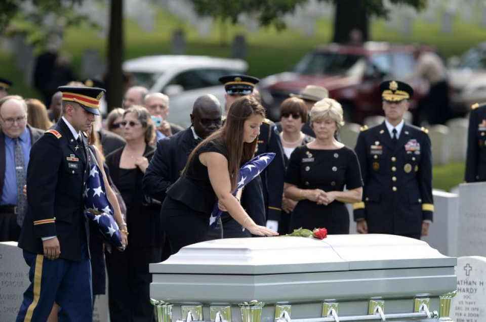 Amelia Greene with the casket of her father, U.S. Army Maj. Gen. Harold Greene, at Arlington National Cemetery. (Amelia Greene / Courtesy Amelia Greene)