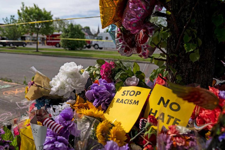 A memorial across the street from Tops Friendly Market at Jefferson Avenue and Riley Street on Wednesday, May 18, 2022 in Buffalo, NY. The Supermarket was the site of a fatal shooting of 10 people at a grocery store in a historically Black neighborhood of Buffalo by a young white gunman is being investigated as a hate crime and an act of racially motivated violent extremism, according to federal officials.