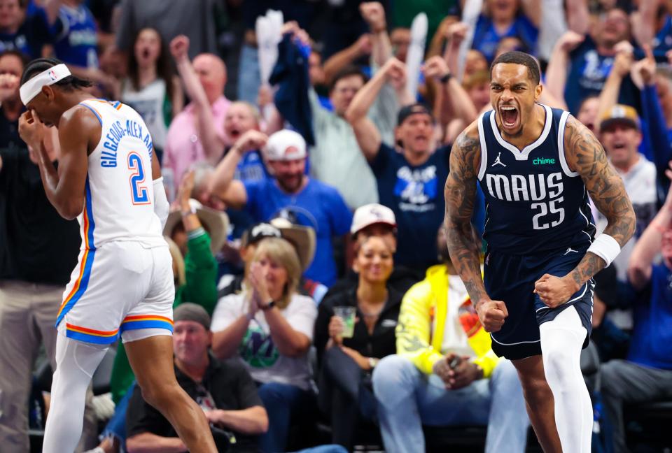 May 11, 2024; Dallas, Texas, USA; Dallas Mavericks forward P.J. Washington (25) reacts in front of Oklahoma City Thunder guard Shai Gilgeous-Alexander (2) after dunking during the second half during game three of the second round for the 2024 NBA playoffs at American Airlines Center.