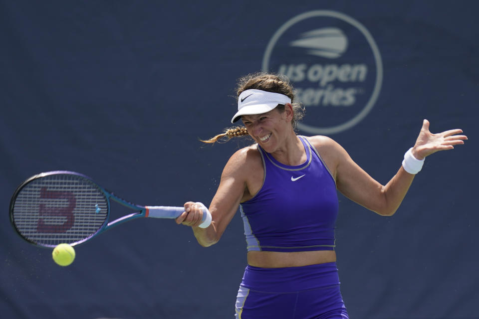 FILE - Victoria Azarenka, of Belarus, returns during a match against Tereza Martincova, of the Czech Republic, at the Citi Open tennis tournament in Washington, Friday, Aug. 5, 2022. Two-time major champion and former No. 1 Victoria Azarenka has been dropped from a pre-U.S. Open exhibition event raising money for humanitarian assistance in Ukraine. Azarenka is from Belarus, which helped Russia launch its invasion of Ukraine in February. (AP Photo/Carolyn Kaster, File)