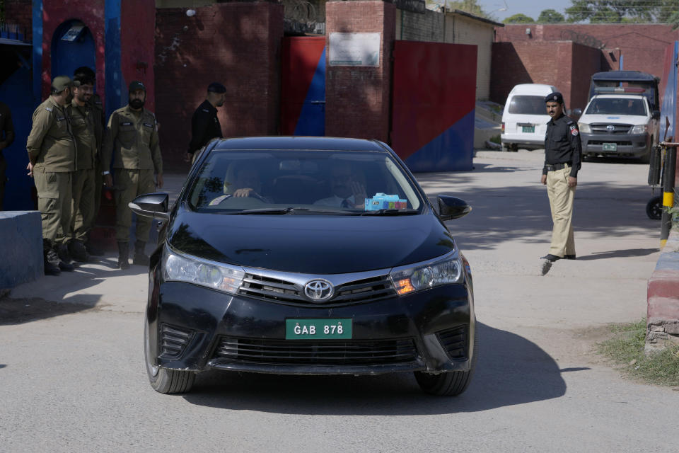 A car carrying special court judge Abul Hasnat Zulqarnain leaves after hearing of the Cipher case against Pakistan's former Prime Minister Imran Khan, at the Adiyala prison, in Rawalpindi, Pakistan, Monday, Oct. 23, 2023. A Pakistani court on Monday indicted Khan on charges of revealing official secrets after his 2022 ouster from office in another slap to the former prime minister who will likely be unable to run in the upcoming parliamentary elections in late January. (AP Photo/Anjum Naveed)