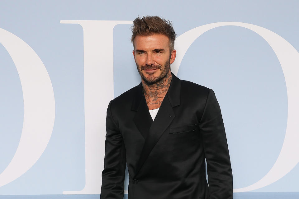 David Beckham in a black suit at the Dior Homme Menswear Spring Summer 2023 show as part of Paris Fashion Week  on June 24, 2022 in Paris, France. (Photo by Marc Piasecki/WireImage)