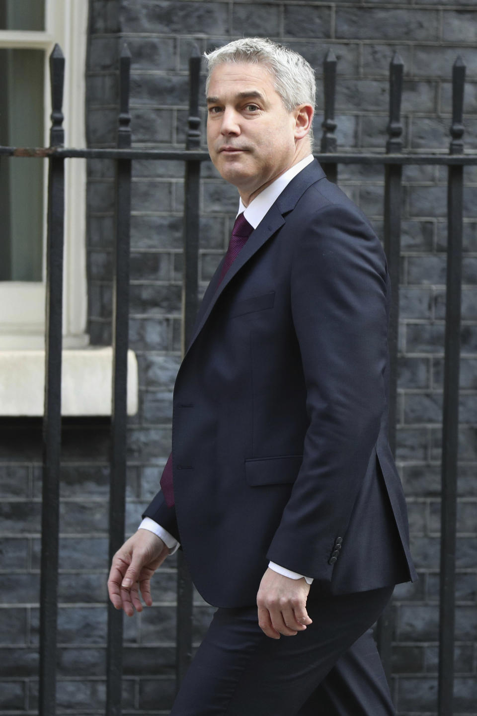 Britain's Brexit Secretary Stephen Barclay in Downing Street, ahead of the latest round of debates in the House of Commons concerning Brexit issues, Monday April 1, 2019. Britain’s Parliament gets another chance Monday to debate and vote on the Brexit divorce from the European Union, with the knowledge that if no agreement is reached by April 12, Britain will crash out of the EU without a plan for future relations. (Jonathan Brady/PA via AP)