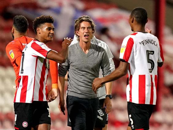 Brentford manager Thomas Frank celebrates victory (PA)