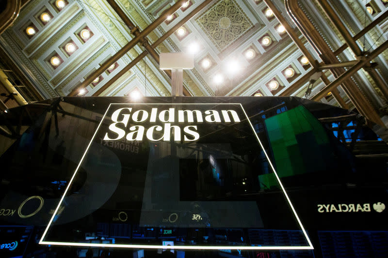 A Goldman Sachs sign is seen above the floor of the New York Stock Exchange shortly after the opening bell in the Manhattan borough of New York, U.S. on January 24, 2014. REUTERS/Lucas Jackson