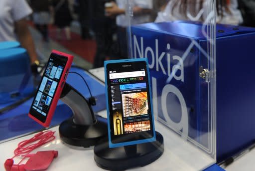 A Nokia N9 smartphone is displayed at the CommunicAsia exhibition and conference in Singapore. Nokia's latest attempt to win back market share with its N9 phone received mixed reviews but analysts said the real test will come when it releases new models using the Windows Phone 7 operating system