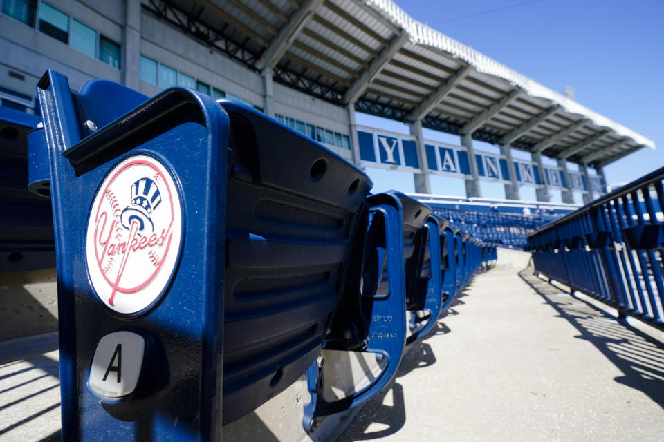 Empty stands are shown at George M. Steinbrenner Field during a New York Yankees spring training baseball workout Tuesday, Feb. 23, 2021, in Tampa, Fla. (AP Photo/Frank Franklin II)