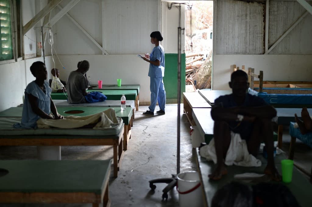 Des patients atteints du choléra à Haïti en 2016. PHOTO D'ILLUSTRATION - HECTOR RETAMAL / AFP