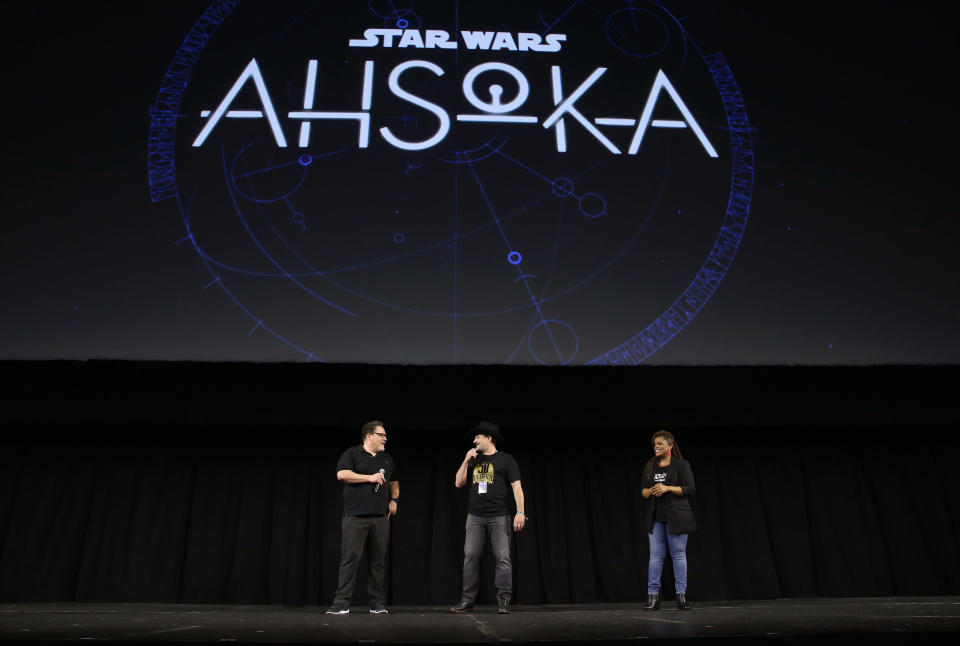 Jon Favreau and Dave Filoni&nbsp;discuss the upcoming Disney+ series “Ahsoka” with Lucasfilm panel host Yvette Nicole Brown at Star Wars Celebration. - Credit: Jesse Grant/Getty Images for Disney