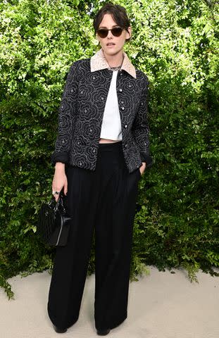 <p>Jon Kopaloff/WireImage</p> Kristen Stewart attends the Chanel Academy Women's Luncheon at the at the Academy Museum of Motion Pictures in Los Angeles