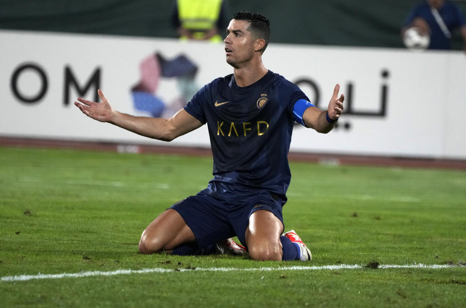 FILE - Saudi Arabia's Al Nassr Cristiano Ronaldo reacts in a match with Iran's Persepolis during their AFC Champions League soccer match at the Azadi Stadium in Tehran, Iran, Tuesday, Sept. 19, 2023. Cristiano Ronaldo has come under heavy criticism after seemingly making an offensive gesture following Al Nassr’s 3-2 victory over Al Shabab in a Saudi Pro League match on Sunday, Feb. 25, 2024. (AP Photo/Vahid Salemi), File)