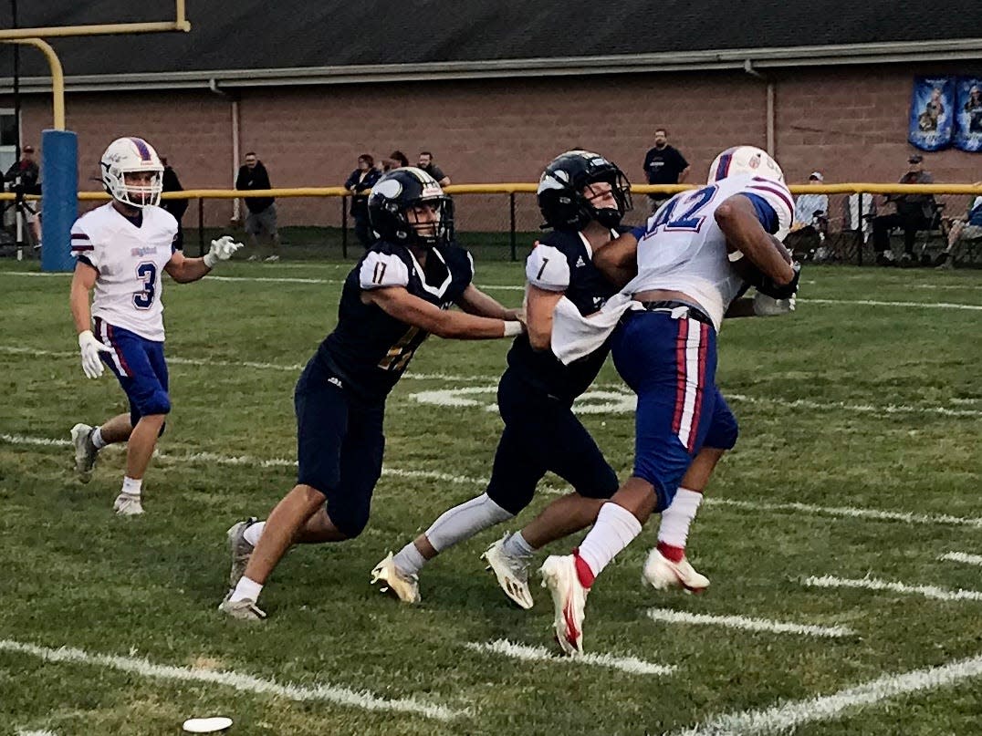 Highland running back Dane Nauman runs for a touchdown against River Valley last football season.