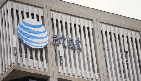 An AT&T Logo is pictured on the side of a building in Pasadena, California, January 26, 2015. REUTERS/Mario Anzuoni