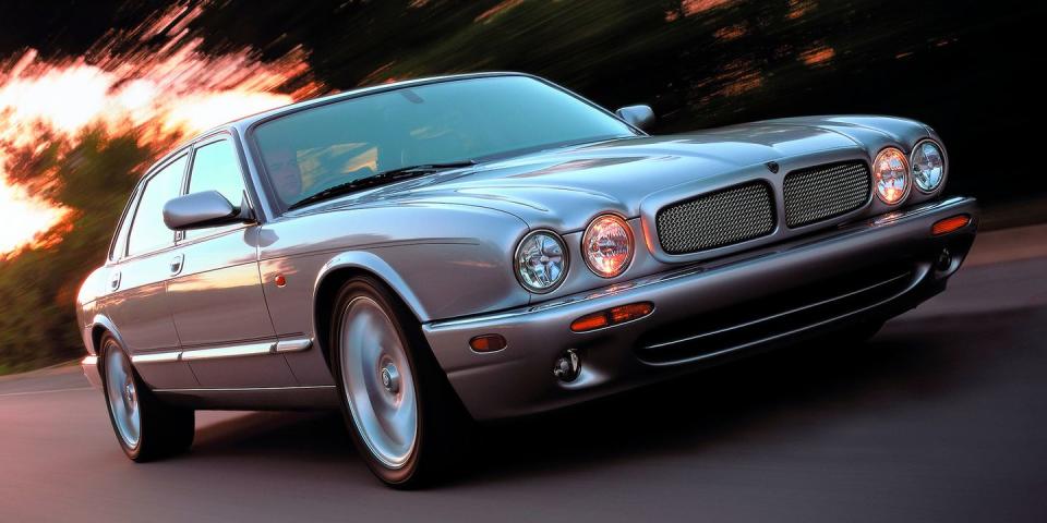 <p>People buy old Jaguars for the classy looks, but when equipped with the automaker's supercharged V-8, they're great performers too. Like the German executive sedans it competed with, the XJR was limited to 155 mph and they're <span class="redactor-unlink">easy to find for around $10,000</span>. Just leave some room in your budget for maintenance. <a href="https://www.ebay.com/itm/1998-Jaguar-XJR/303227567404?hash=item4699c57d2c:g:45wAAOSwX91dB~Yy" rel="nofollow noopener" target="_blank" data-ylk="slk:This black example;elm:context_link;itc:0;sec:content-canvas" class="link ">This black example</a> is currently listed on eBay. </p>