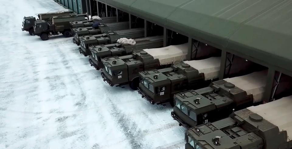Screenshot of video from Russia's Western Military District showing drills with soldiers, tanks, and missile launchers