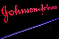 FILE PHOTO: FILE PHOTO: The Johnson & Johnson logo is displayed on a screen on the floor of the NYSE in New York