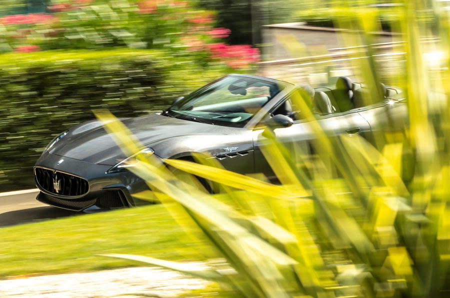 Maserati Grancabrio without camouflage driving past bush