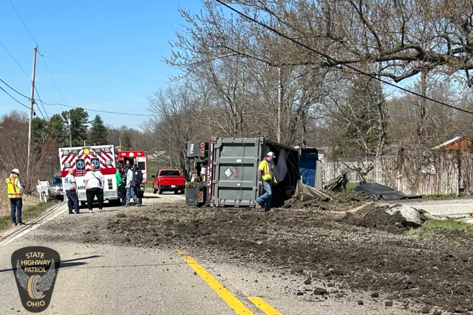 Crews respond to an overturned truck carrying 40,000 pounds of contaminated soil from the site of the February train derailment in East Palestine, Ohio.