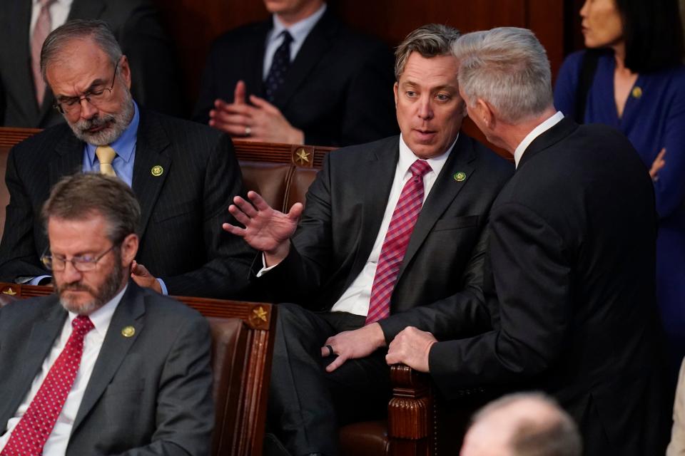 Rep. Kevin McCarthy, R-Calif., right, talks with Rep. Andy Ogles, R-Tenn., on Jan. 5 in the House chamber.