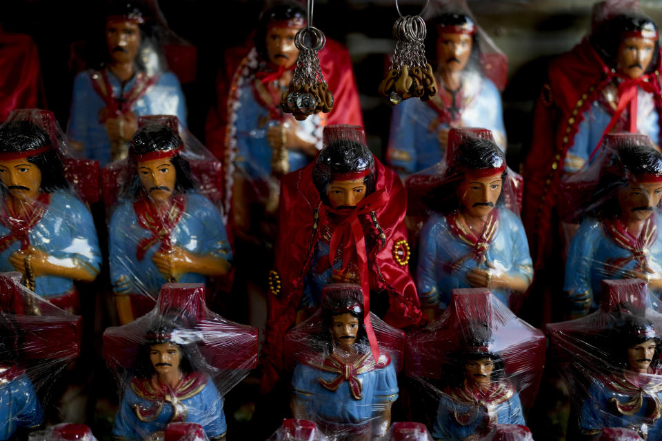 Figures of Argentina's folk Saint "Gauchito" Gil are displayed for sale at his sanctuary in Mercedes Corrientes, Argentina, Saturday, Jan. 6, 2024. Every Jan. 8, devotees from across the country visit his sanctuary to ask for miracles or give him thanks.(AP Photo/Natacha Pisarenko)
