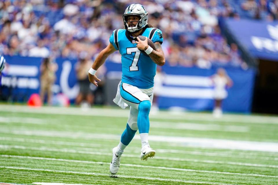 Carolina Panthers quarterback Will Grier (7) scrambles against the Indianapolis Colts during the second half of an NFL exhibition football game in Indianapolis Sunday.