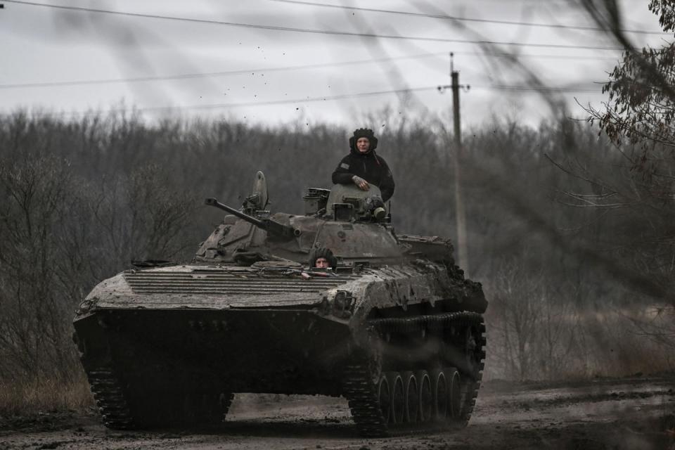 Ukrainian servicemen on a BMP-2 tank drive towards the city of Bakhmut on Saturday (AFP/Getty)