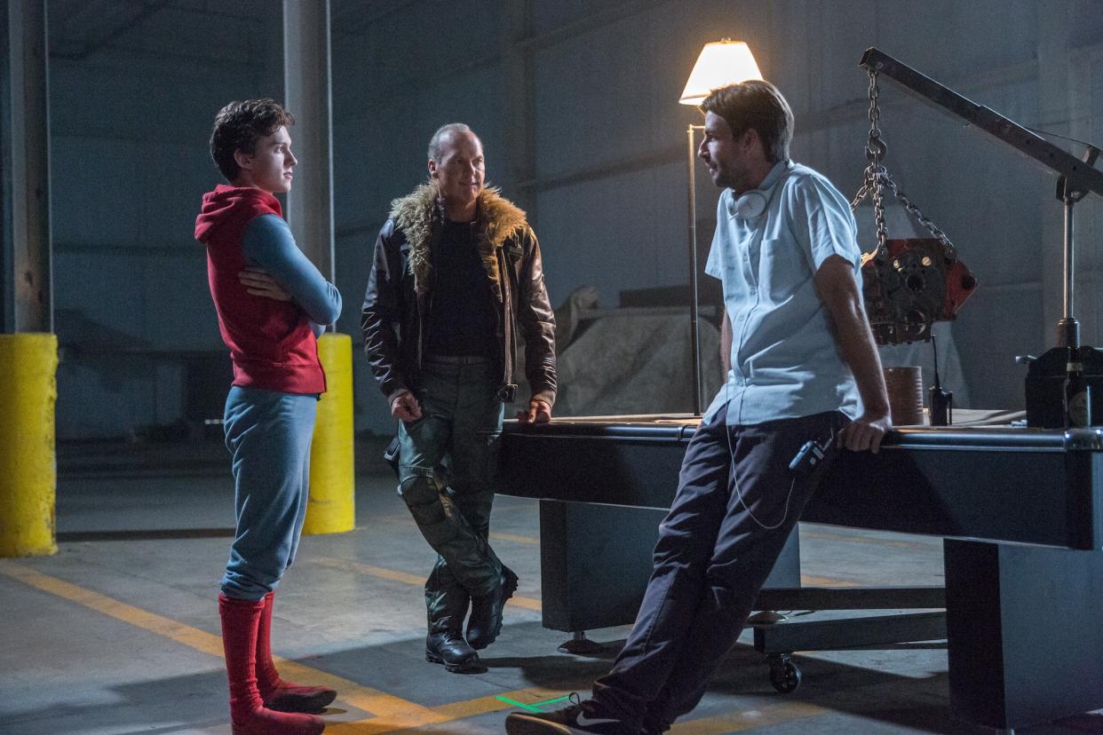 Tom Holland (in “homemade” Spidey suit), Michael Keaton, and director Jon Watts on the set of <i>Spider-Man: Homecoming</i>. (Photo: Columbia Pictures)