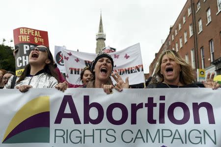 Demonstrators take part in a protest to urge the Irish Government to repeal the 8th amendment to the constitution, which enforces strict limitations to a woman's right to an abortion, in Dublin, Ireland September 24, 2016. REUTERS/Clodagh Kilcoyne