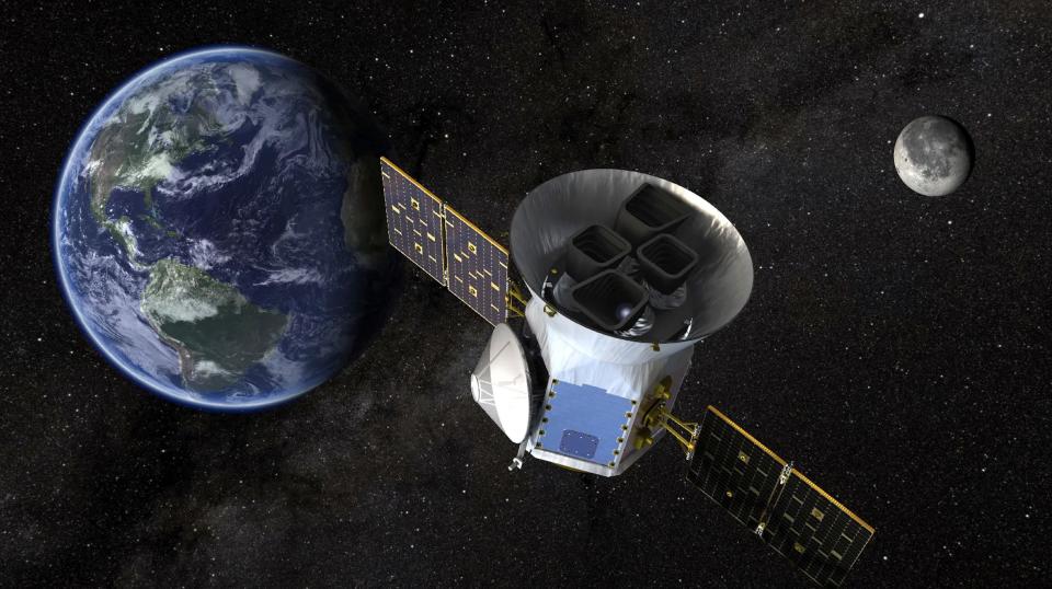 This image provided by NASA shows an artist’s illustration of the agency's Tess telescope, which helped discover six planets 100 light-years from Earth orbiting a bright nearby star in perfect rhythmic harmony.