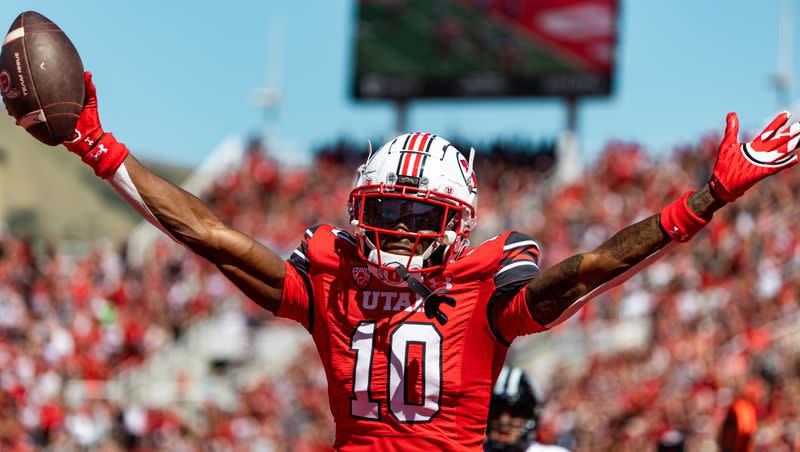 Utah Utes wide receiver Money Parks (10) celebrates his touchdown during the second quarter in the football game against the Weber State Wildcats at Rice-Eccles Stadium in Salt Lake City on Saturday, Sept. 16, 2023.