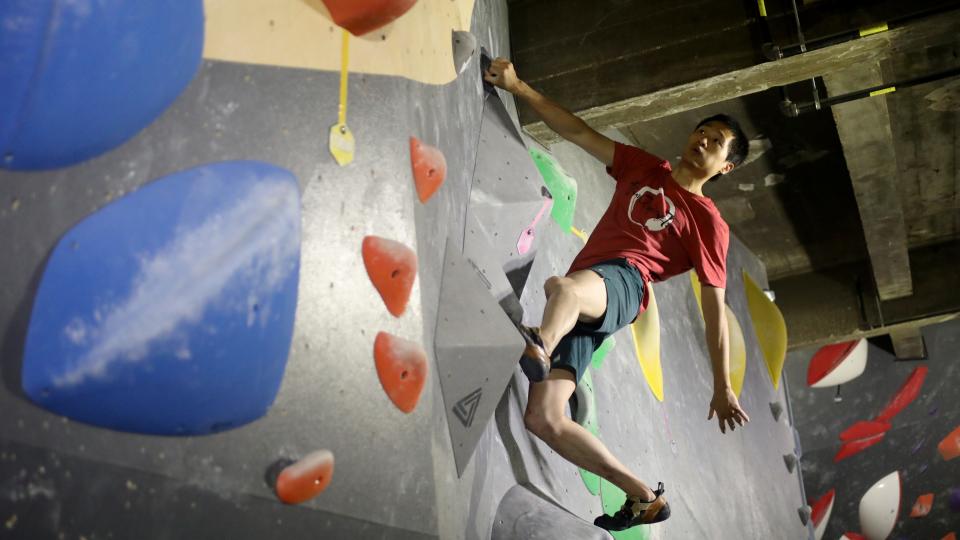 (image for video) Junrui Wang, of New York City, climbs at Method Climbing, in Newark. Wang was there with the Asian Climbing Tribe. Sunday, July 10, 2022