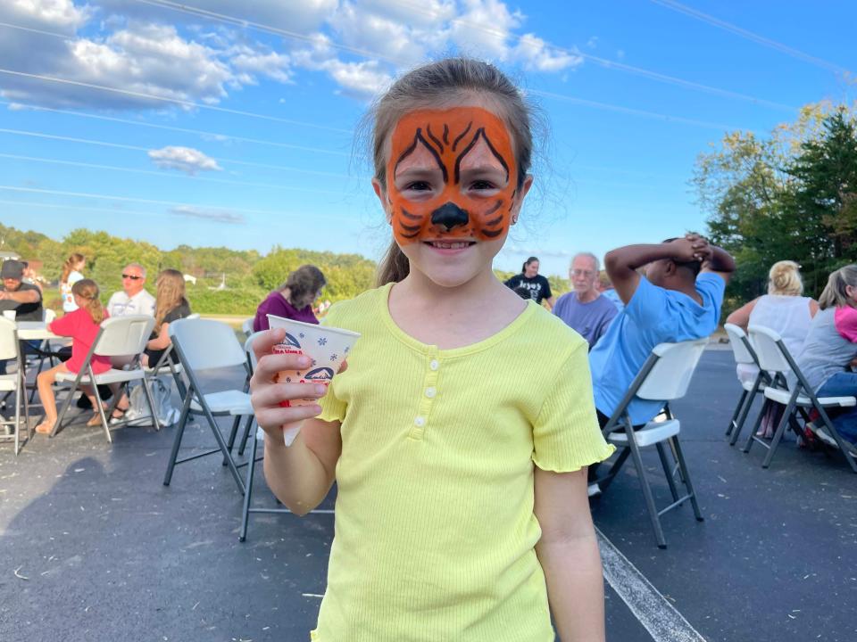 Darina Kisakova, 7, visited Sierra Duncan the face painter and came away with a face full of tiger.