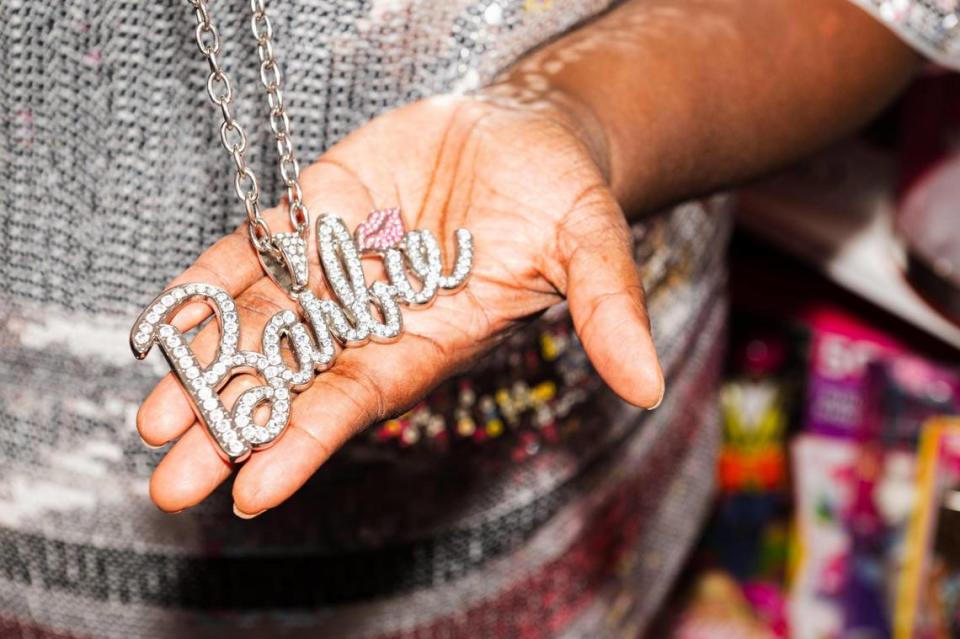 Sonya Larson’s love of all things Barbie extends to her own clothing and jewelry, like this blinged-out necklace. “Barbie is really trying to make it so that everyone understands that she’s a representation of everyone,” she said.