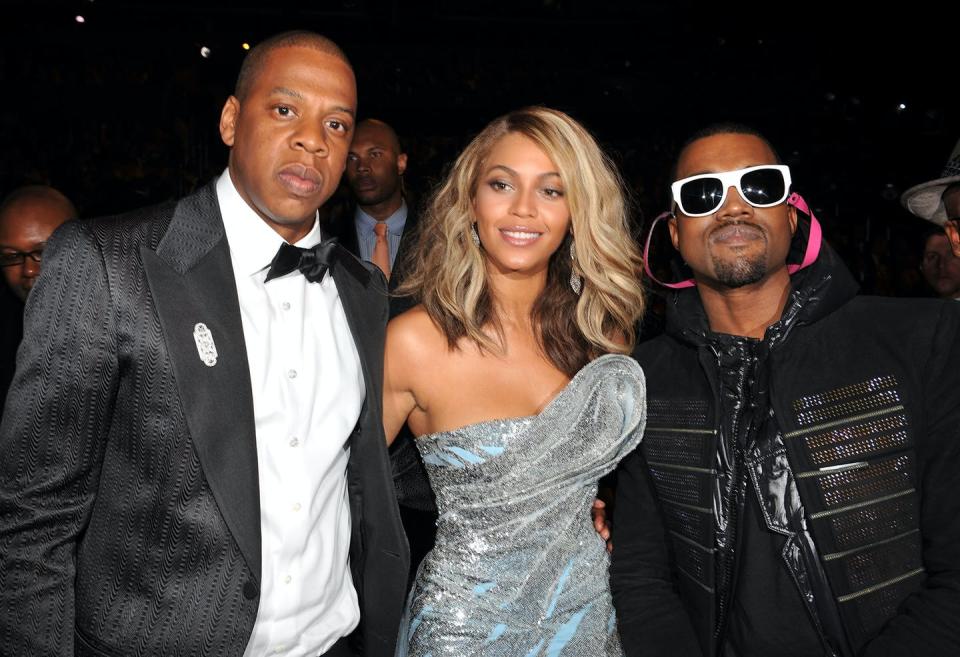 Three celebrities attend an event.