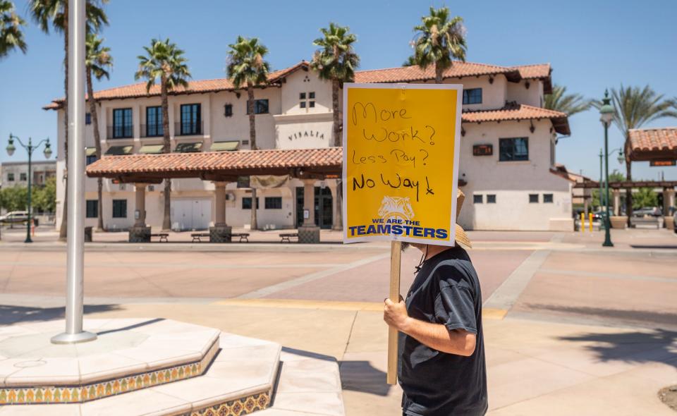 With no city buses in sight, about 80 drivers, dispatchers, and others associated with Visalia Transit, protest Saturday, July 8, 2023 at the Transit Center to express their expectations for better wages and other conditions from Transdev, the operator for Visalia Transit.
