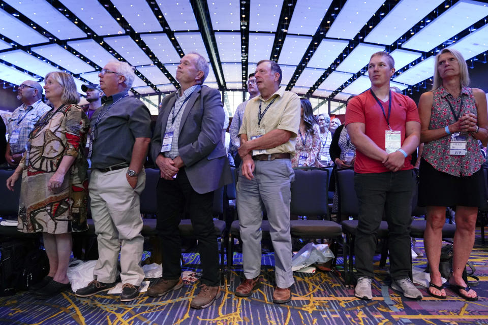 Audience members listen to South Dakota Gov. Kristi Noem speak during the Family Leadership Summit, Friday, July 16, 2021, in Des Moines, Iowa. (AP Photo/Charlie Neibergall)