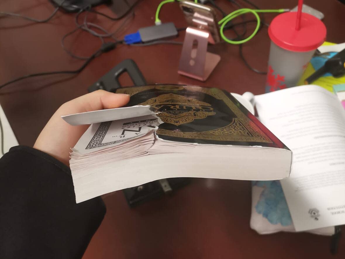 Kawartha Pine Ridge District School Board says they became aware of a 'concerning' incident of Islamophobia on March 3 at Courtice Secondary School after a student damaged a copy of a Qur'an. The Qur'an had apparent damage on the front and had missing pages on the inside. (Submitted by Munawara Mazlomyar - image credit)