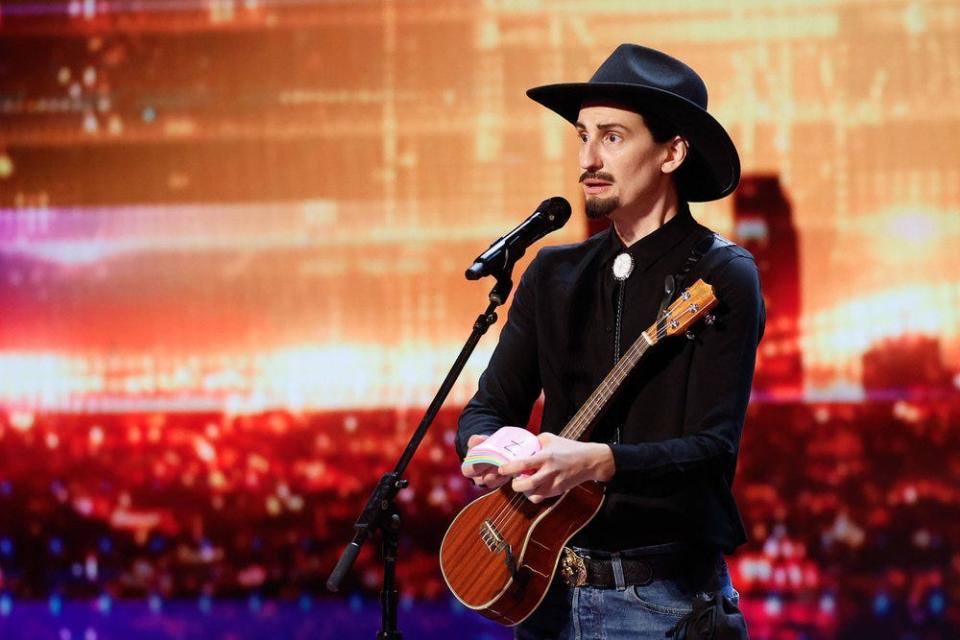 Dressed in a black cowboy hat and matching button-down shirt, the undercover comedian appeared onstage as Sunny Chatum, a mustached singer-songwriter from Paris, Texas.