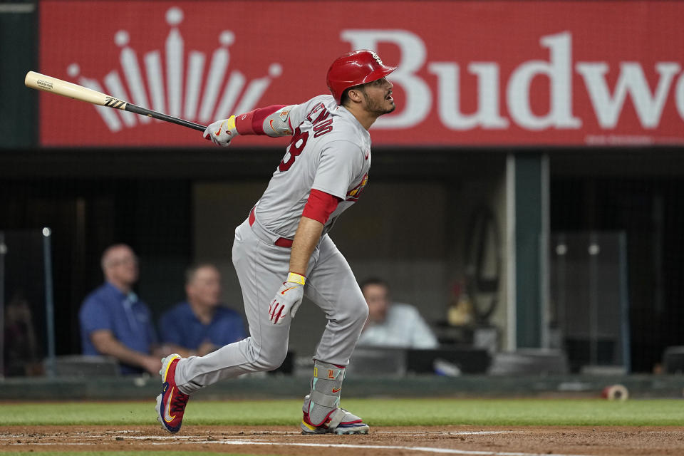 St. Louis Cardinals' Nolan Arenado watches his two-run home run against the Texas Rangers during the first inning of a baseball game Tuesday, June 6, 2023, in Arlington, Texas. (AP Photo/Tony Gutierrez)