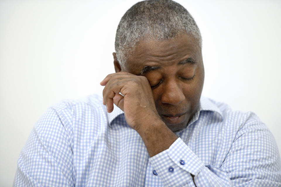 Charles Richardson, of Baltimore, wipes his eye while discussing his alleged abuse decades ago by a Catholic priest, in Baltimore on Wednesday, Sept. 20, 2023. Black victims have largely been invisible in the Catholic sexual abuse crisis. Richardson recently came forward after the state of Maryland removed the civil statute of limitations for child sex abuse victims. (AP Photo/Steve Ruark)