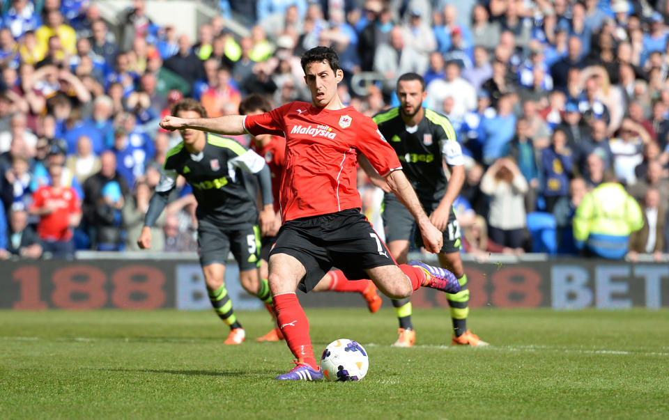 Cardiff City's Peter Whittingham scores his side's first goal of the game during their English Premier League soccer match against Stoke City at the Cardiff City Stadium, Cardiff, Wales, Saturday, April 19, 2014. (AP Photo/Andrew Matthews, PA Wire) UNITED KINGDOM OUT - NO SALES - NO ARCHIVES