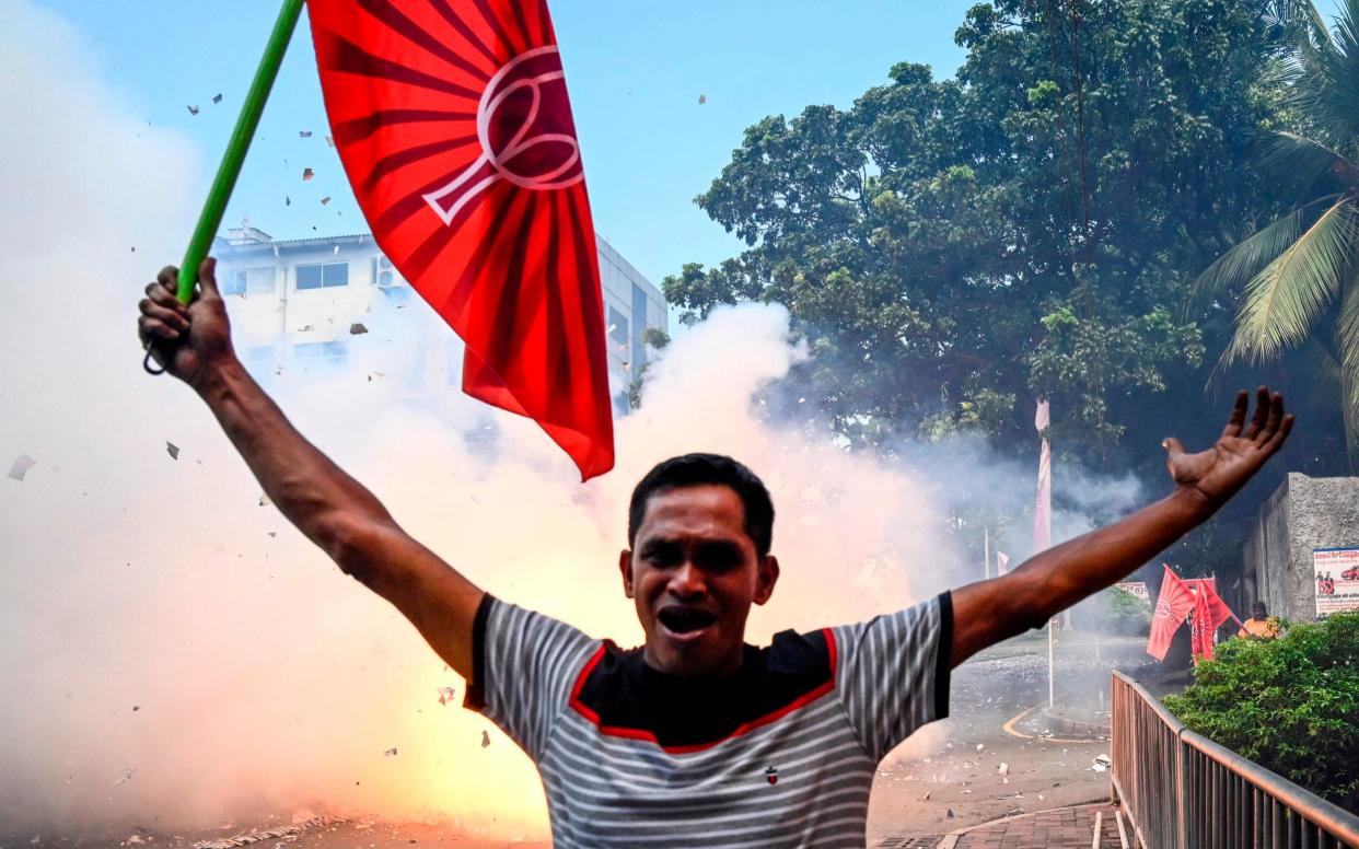 A Gotabaya Rajapaksa celebrates in Colombo - AFP