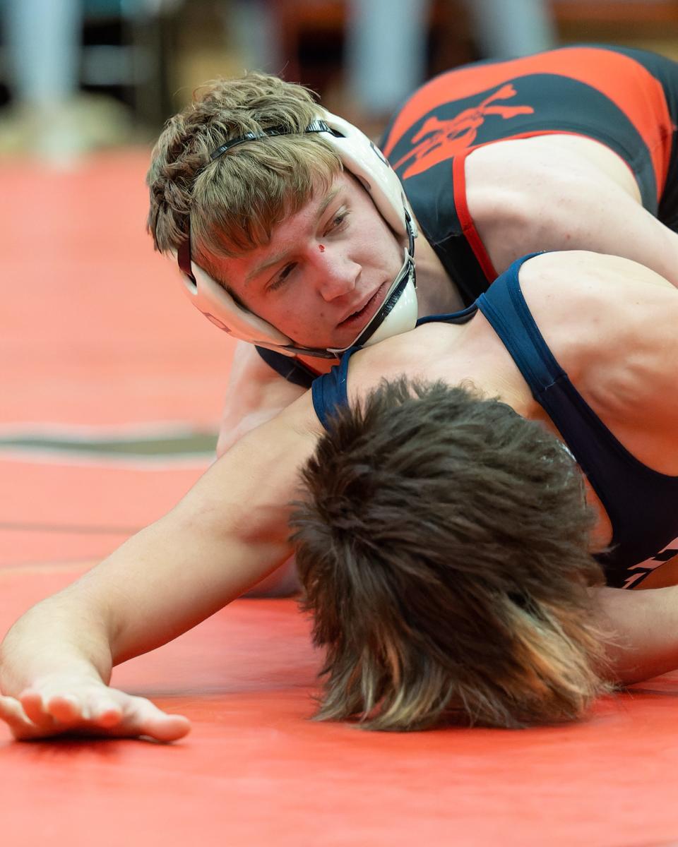 Pinckney's Lucas Nagle (top) is a two-time all-stater who was third in the state last season.