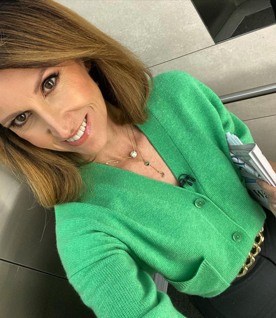Natalie Barr in a green cardigan