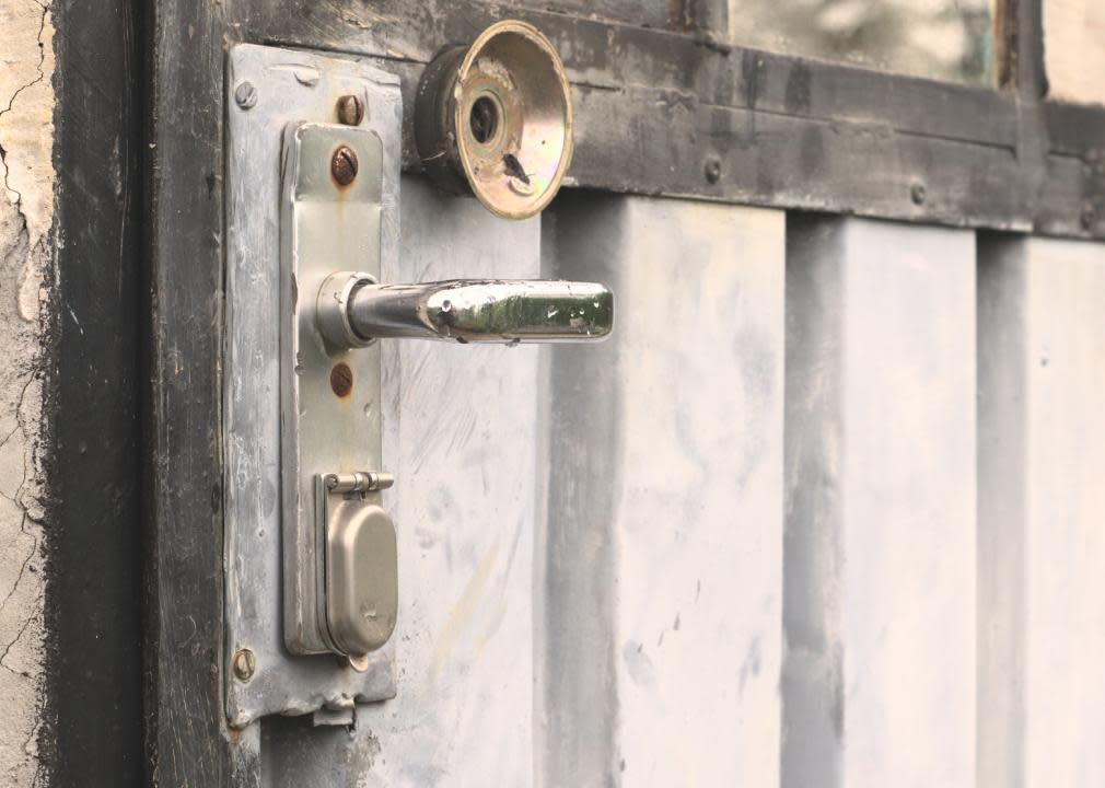 Old retro door knob on a door.