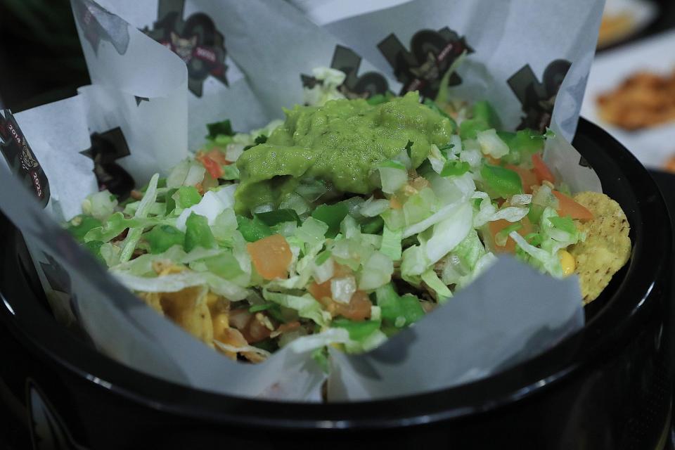 The Carnitas Nachos are back for the 10th season of the El Paso Chihuahuas. The nachos come with shredded pork, lettuce, pico de gallo and guacamole.