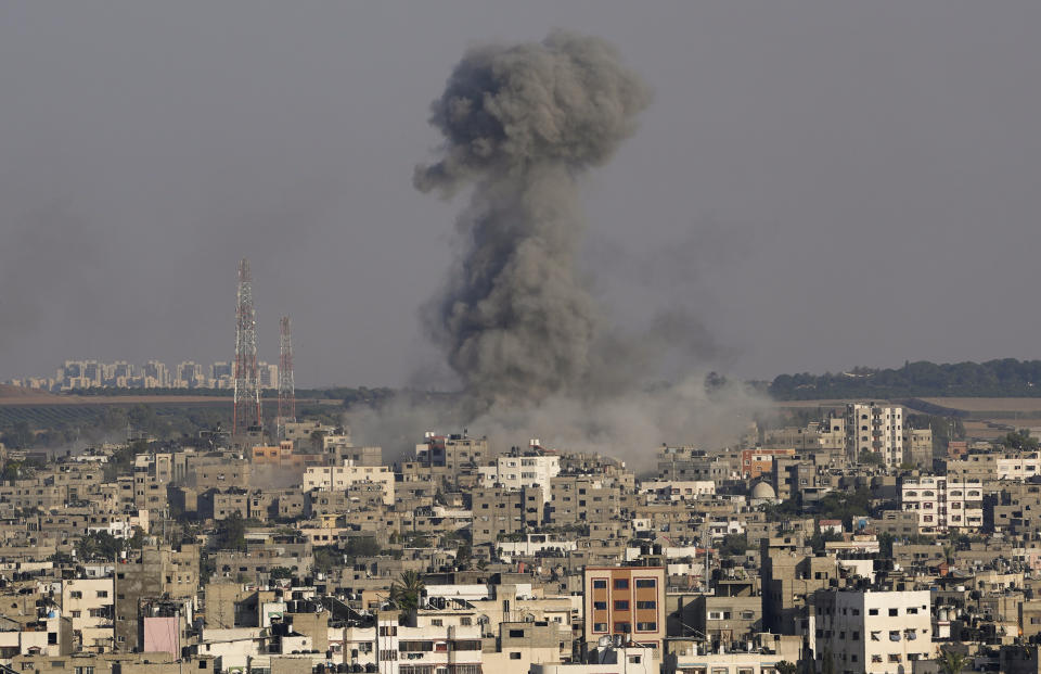 Smoke rises following Israeli airstrikes on a building in Gaza City's Shijaiyah neighborhood, Sunday, Aug. 7, 2022. (AP Photo/Hatem Moussa)