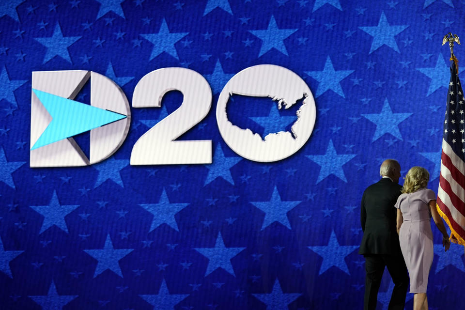 Democratic presidential candidate former Vice President Joe Biden and his wife Jill Biden walks from the stage during the fourth day of the Democratic National Convention, Thursday, Aug. 20, 2020, at the Chase Center in Wilmington, Del. (AP Photo/Andrew Harnik)